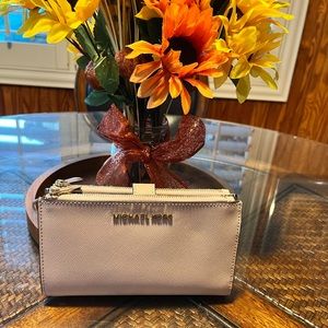 Light pink  wallet with two zipper pouches